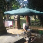 workman laying paving for the seat